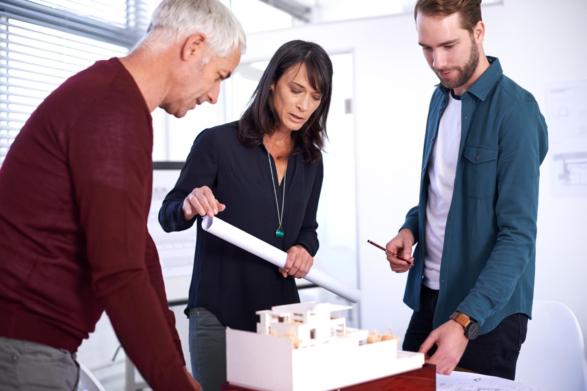 architects-blueprint-teamwork-design-meeting-building-development-with-colleagues-planning-remodelli.jpg